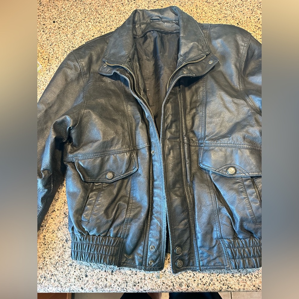 Vintage black leather motorcycle jacket
